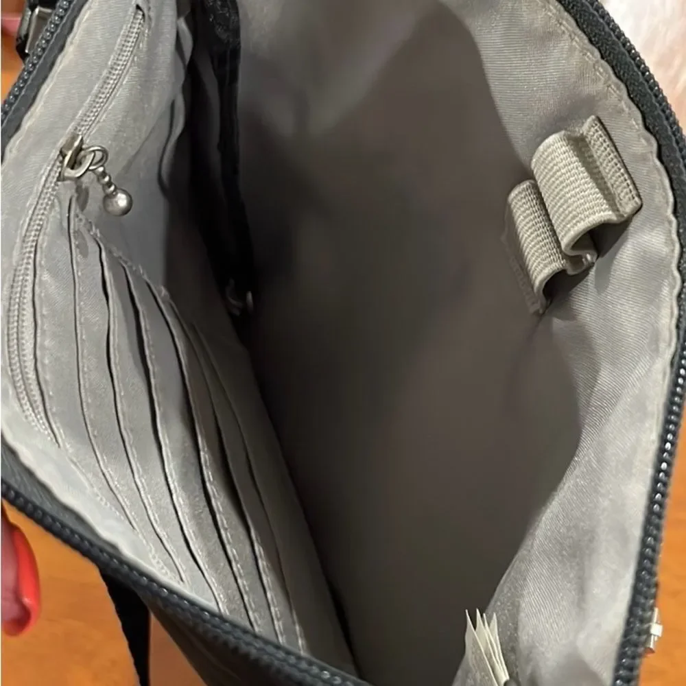 Baggallini gray and black crossbody bag with adjustable straps